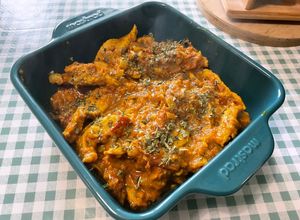 Une photo de Porc au Curry, Tomates, Ail et Gingembre