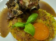 Una foto de lechal al horno