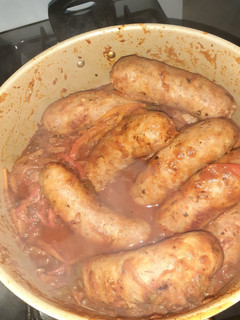 Una foto de Chorizos a la pomarola