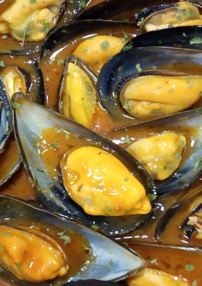 Una foto de Mejillones en salsa picante
