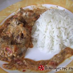 A picture of Beef with tomato sauce yiaourtlou.