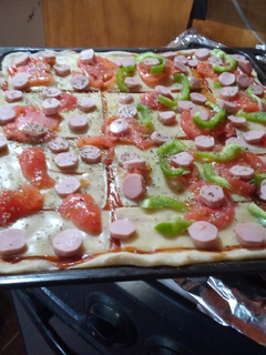 Una foto de Pizza con masa casera