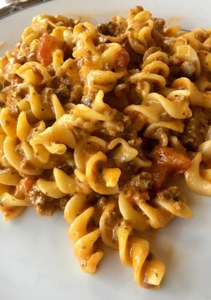 Una foto de Tornillos en salsa de tomate y carne molida