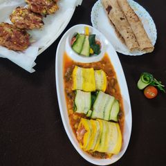 Pumpkin dal gravy Zucchini baked cheese tolls A picture of Pumpkin dal gravy Zucchini baked cheese tolls.