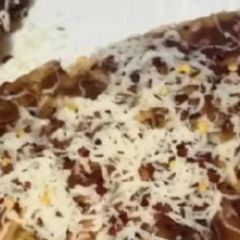 A picture of Mushroom cheese panini.