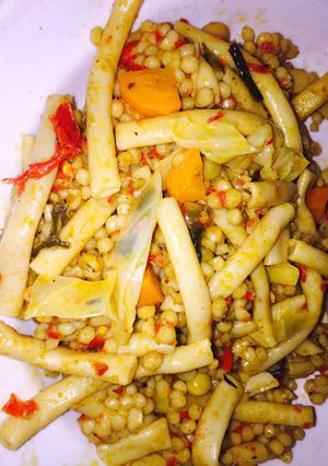 A picture of Jollof din taliya da amberuwa.
