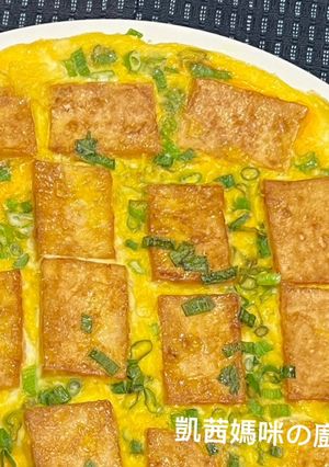 A picture of Pan-Fried Tofu and Eggs with Oyster Sauce.