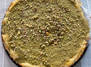Foto principal de Tarta de queso La Viña con pistacho