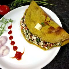 A picture of Navaratan paneer cheela.
