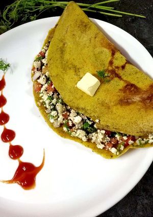 A picture of Navaratan paneer cheela.