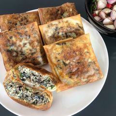 A picture of Martabak Telor - Indonesian Savory Crunchy Meat Pancake.