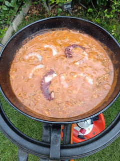 Una foto de Arroz meloso con langostinos y pulpo