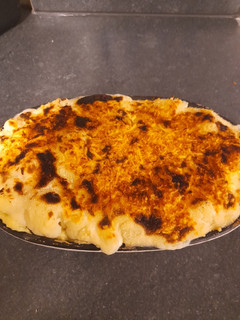A picture of Childproof cauliflower bake with chickenburgers.