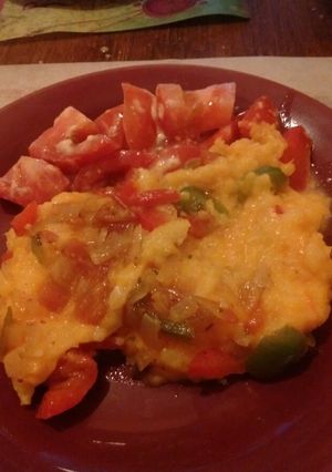 Una foto de Puré de calabaza con salsa y queso