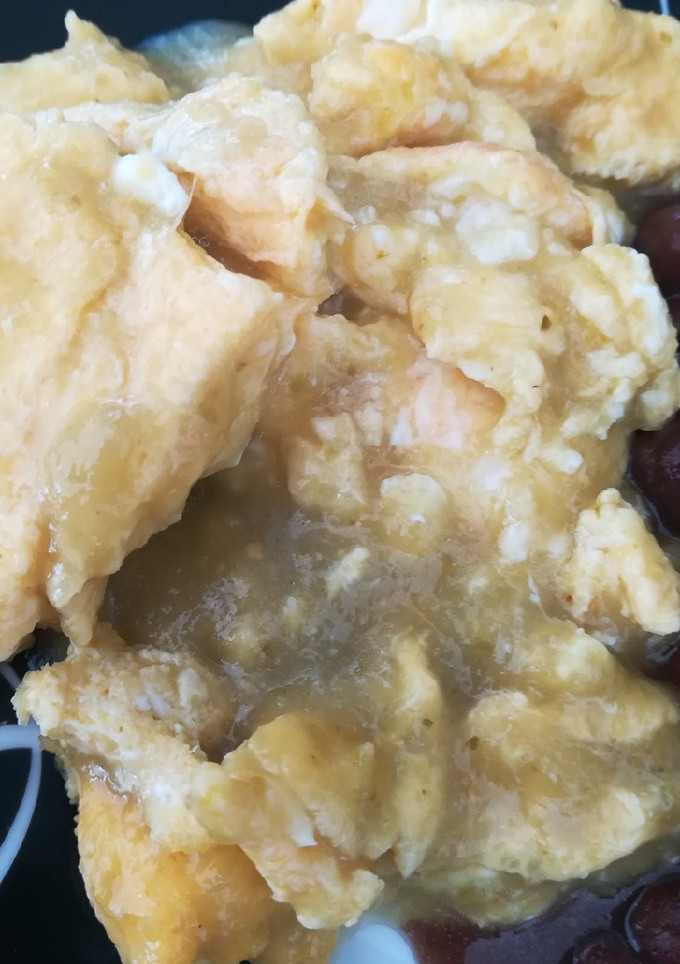 Una foto de Huevo en salsa verde