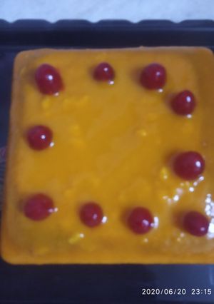 A picture of Mango cherry glaze cake.