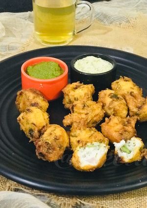 A picture of Punugulu a SouthIndian tea time snack.
