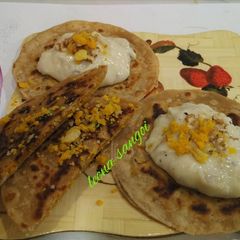 A picture of Motichoor Paratha with Rabdi.