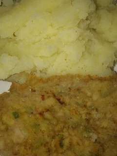 Una foto de Milanesa con puré