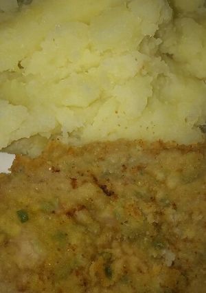 Una foto de Milanesa con puré