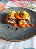 Involtini di melanzana, mortadella e mozzarella, gratinati al forno