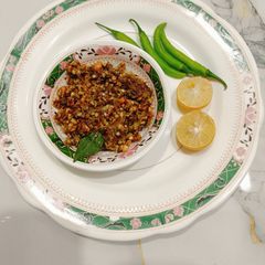 A picture of Green Chilli Thetcha.