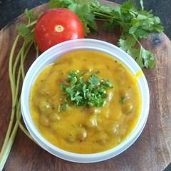 A picture of Kale Chana black gram in Besan Gravy.