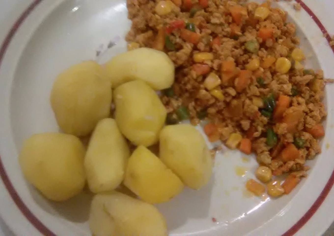 Boiled irish potatoes with egg sauce
