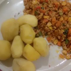 Boiled irish potatoes with egg sauce A picture of Boiled irish potatoes with egg sauce.