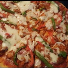 A picture of Red sauce cheesy pizza.