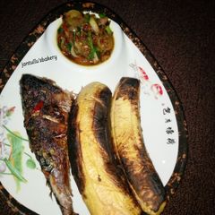 Rosted fish and plantain A picture of Rosted fish and plantain.
