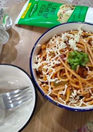 A picture of Indian style tomato Spaghetti.