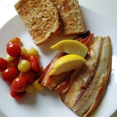 A picture of Freshly Grilled Manx Kippers with Balsamic Mixed Tomatoes.