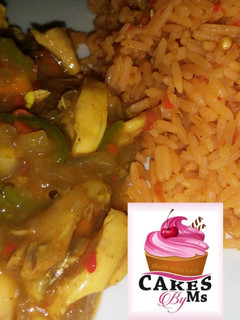 A picture of Jallof Rice With Shredded Chicken.