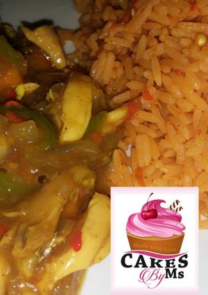 A picture of Jallof Rice With Shredded Chicken.