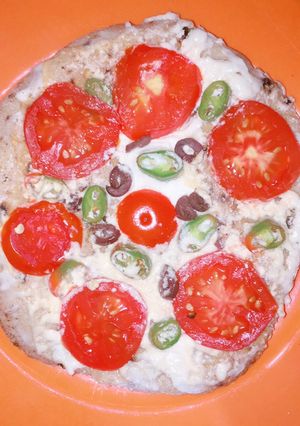 صورة لوصفة بيتزا بالعيش 😁🍕❤️