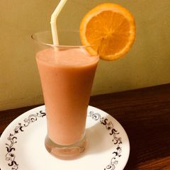 A picture of Papaya-banana -orange smoothie.
