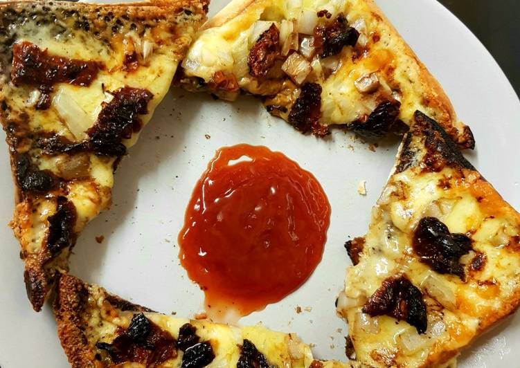 How to Make Super Quick Homemade My New style Of Cheese on toast with Sun dried Tomatoes. 😁