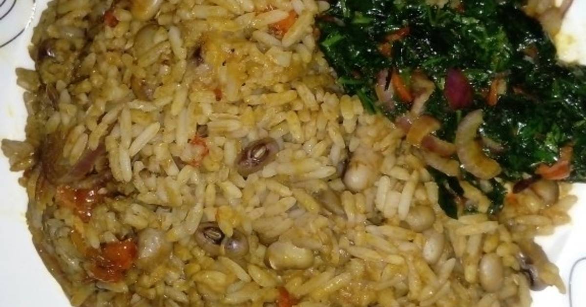 Palm Oil Rice and Beans Jellof Garnished with vegetable Recipe by