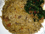 Palm Oil Rice and Beans Jellof Garnished with vegetable