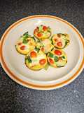 Egg Cups With Tomato, Swiss, and Spinach
