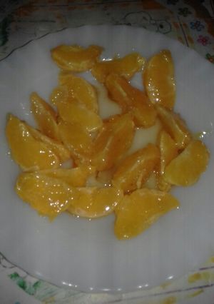 Una foto de Gajos de naranja acarameladas !!