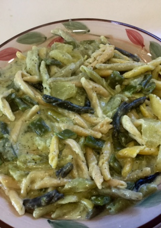Una foto de Trofie a la parmesana