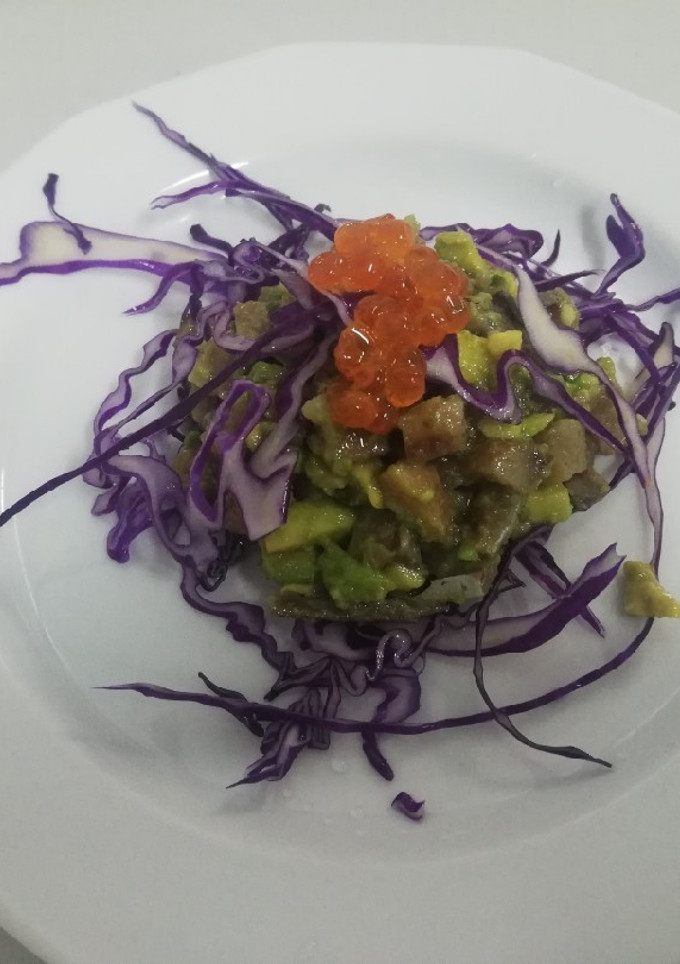 Una foto de Sardinas saladas en ensalada
