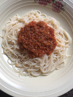 A picture of Spaghetti with leftover stew.