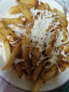 A picture of Cheesy Paprika Fries.