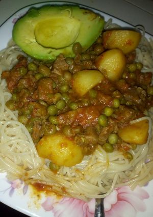 A picture of Pasta and beaf peas stew.