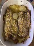 Lubina al horno con ajo, vino blanco y hierbas