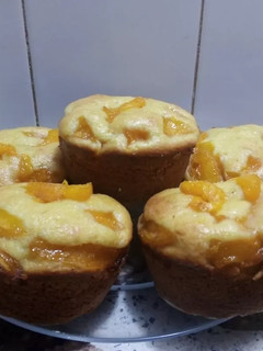 Una foto de Muffins de Duraznos en almíbar 🍑