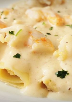 Una foto de Canelones XL  de Lubina y Langostinos